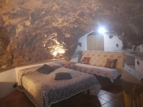Posteľ alebo postele v izbe v ubytovaní CASITA RURAL y CASA CUEVA EL PERUCHO