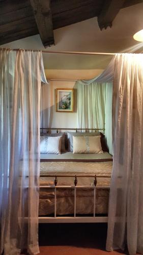 A bed or beds in a room at Posto del Sole