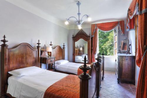 Postel nebo postele na pokoji v ubytování Villa Clara
