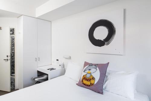 Postel nebo postele na pokoji v ubytování Majestic Minima Hotel