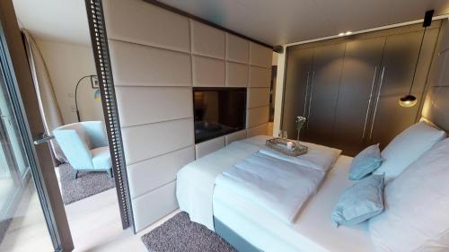 Ένα ή περισσότερα κρεβάτια σε δωμάτιο στο White Pearl Apartment 1.04