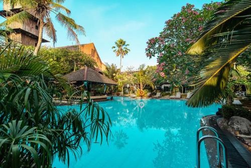 The swimming pool at or close to Jogja Village