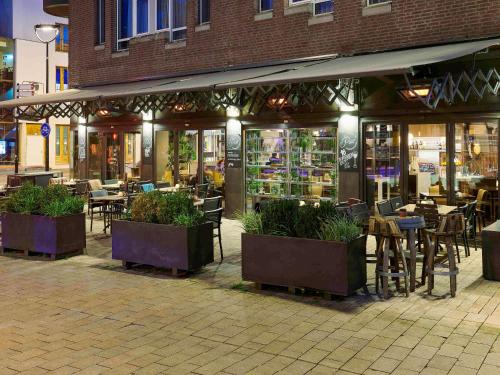 En restaurant eller et spisested på Mercure Hotel Tilburg Centrum