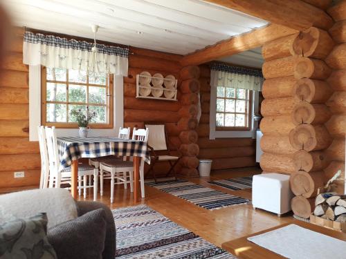 A seating area at Pähkli Seaside Cottage with Cozy Outdoor Patio