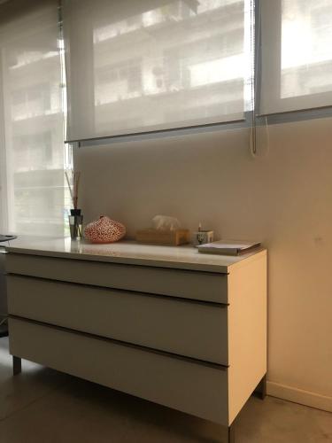 a kitchen with a counter top and a sink at B&B Loft Jamar Gare Du Midi in Brussels