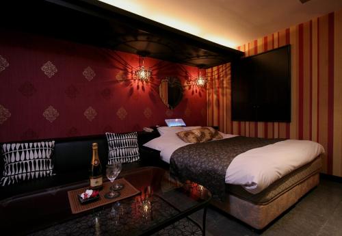 Postel nebo postele na pokoji v ubytování HOTEL BANJAR