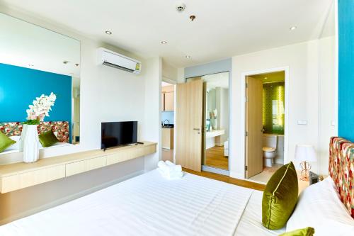 Katil atau katil-katil dalam bilik di Pattaya Seaview l Grande Carribean l Guest Friendly