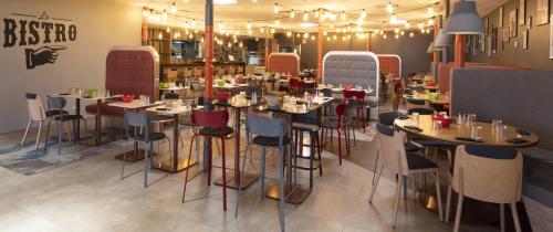 Restaurant ou autre lieu de restauration dans l'établissement Hôtel Mercure Lille Aéroport