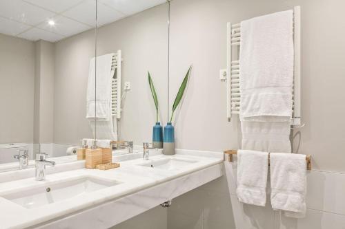 Een badkamer bij Canaan Boutique Apartments Madrid