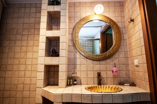 Koupelna v ubytování Elia Portou Rooms