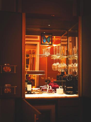 a kitchen with a sink and a counter top at The Cadogan, A Belmond Hotel, London in London
