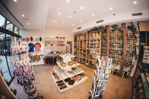 an overhead view of a shoe store with racks of shoes at Hotel Verso in Mostar