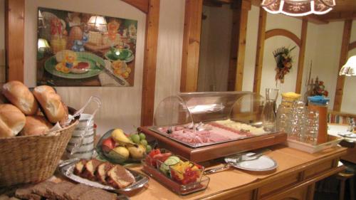 a table with a buffet of food on a table at Haus Rosmarie in Neustift im Stubaital