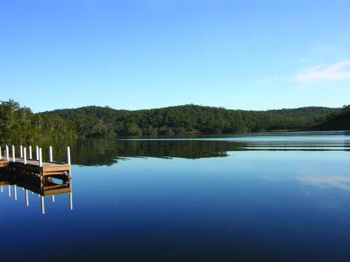a dock on a large body of water at Gipsy Point Lakeside in Gipsy Point