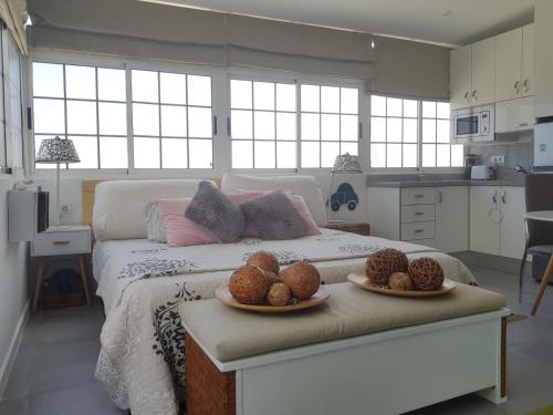 A bed or beds in a room at Apto/Suite Santa Cruz Tenerife