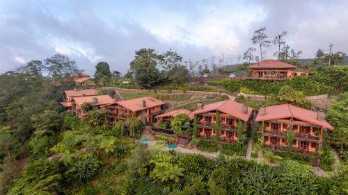 an aerial view of a resort on a hill at Peace Lodge in Vara Blanca