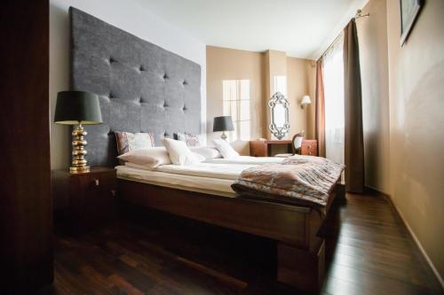 Ένα ή περισσότερα κρεβάτια σε δωμάτιο στο Apartamenty w Villa Park