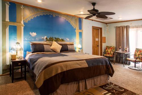 Een bed of bedden in een kamer bij Shane Acres Country Inn