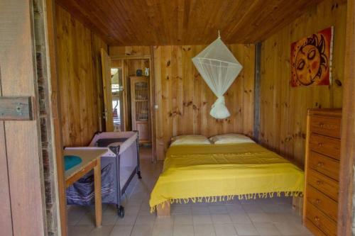 מיטה או מיטות בחדר ב-Chalet mer et montagne