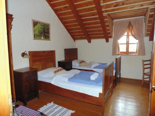 Posteľ alebo postele v izbe v ubytovaní Guest House Kozjak