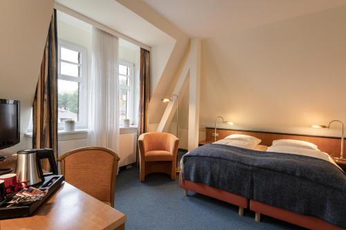 Voodi või voodid majutusasutuse Hotel Neustädter Hof toas