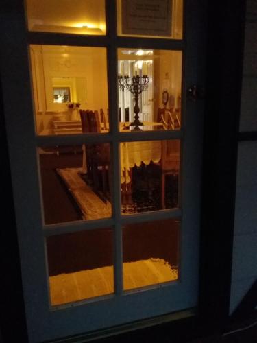a view of a room through a window at Robin's Nest B&B in Wilmot
