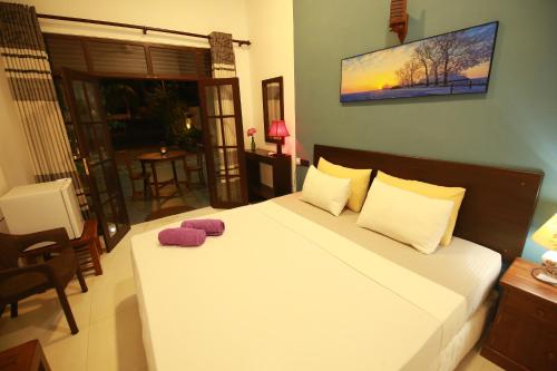 Кровать или кровати в номере Surf Lavender
