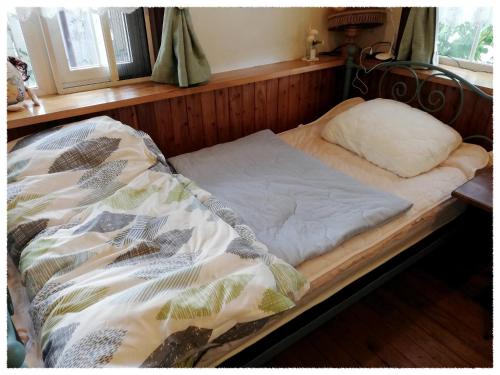 Postel nebo postele na pokoji v ubytování Folks House