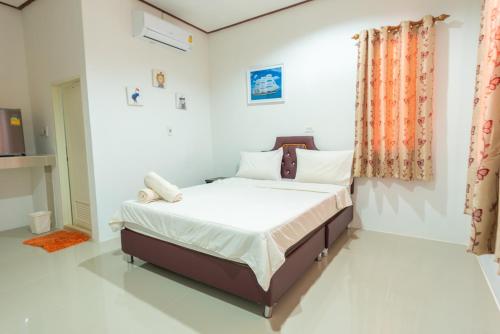 Ліжко або ліжка в номері Khun Ning Resort