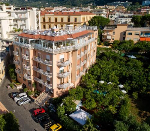 an aerial view of a building in a city at Boutique Hotel Regina in Sorrento