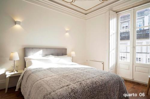 En eller flere senge i et værelse på Santa Catarina Guest House (Porto city center)