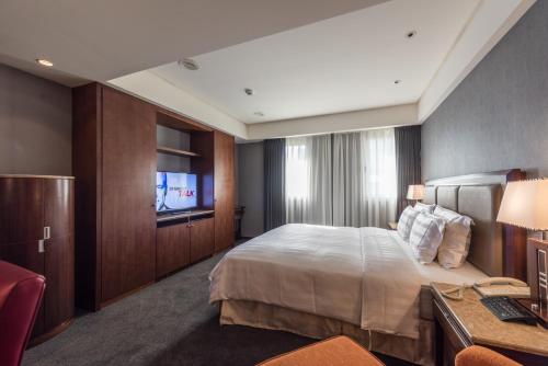 Katil atau katil-katil dalam bilik di Royal Biz Taipei Hotel