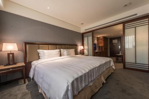 Katil atau katil-katil dalam bilik di Royal Biz Taipei Hotel