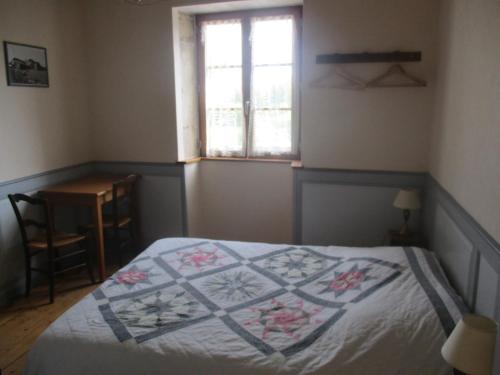 Cama o camas de una habitación en Le gîte de la Petite Résie