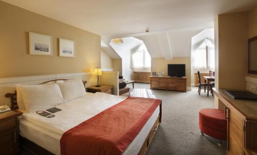 Postel nebo postele na pokoji v ubytování Dedeman Palandoken Ski Lodge Hotel