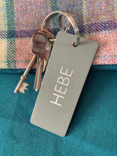 a key chain with a tag that says hello on it at the house@glenbarr in Glenbarr