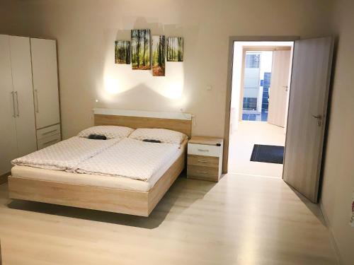 Postel nebo postele na pokoji v ubytování Apartmán 501