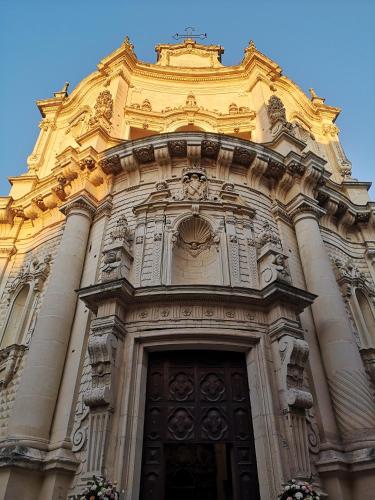 a tall building with a door in front of it at Casa Midori in Lecce