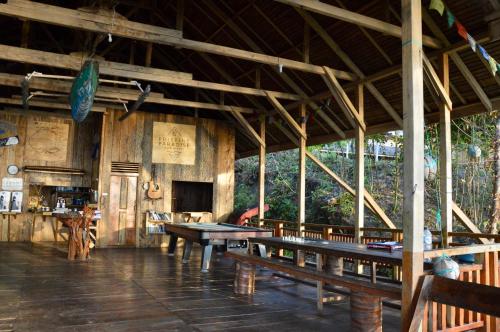 a room with a ping pong table in a building at Pristine Paradise Dive Resort - Togean Islands, Una Una in Pulau Unauna