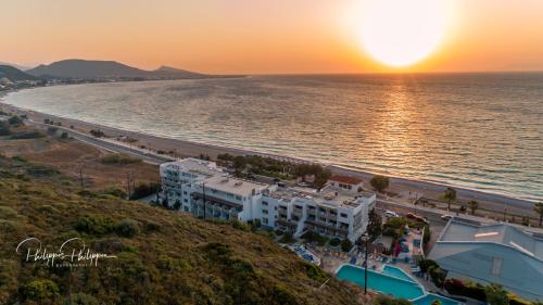 an aerial view of a beach at sunset at Sirene Beach Hotel in Ixia