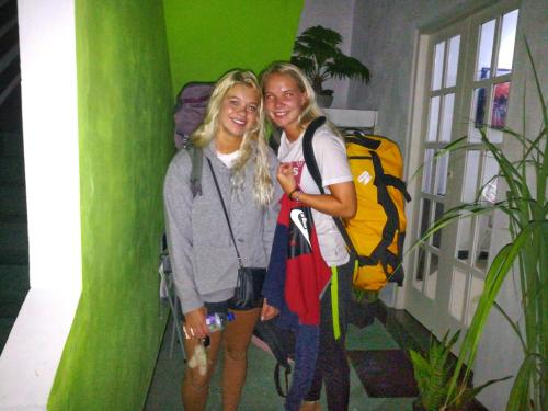 two girls standing next to each other in a room at CHEN VILLA - Near Airport in Negombo