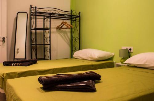 Posteľ alebo postele v izbe v ubytovaní Colors Rooms
