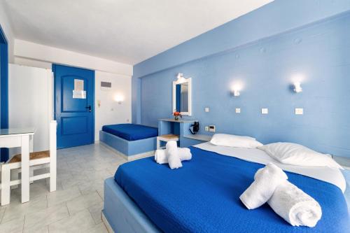 Ένα ή περισσότερα κρεβάτια σε δωμάτιο στο Stratos Apartments & Studios 