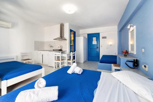 Ένα ή περισσότερα κρεβάτια σε δωμάτιο στο Stratos Apartments & Studios 