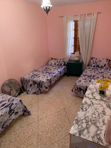 Tempat tidur dalam kamar di Quiet Apartment in El Ksiba / Beni Mellal