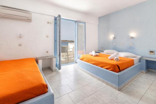 Ένα ή περισσότερα κρεβάτια σε δωμάτιο στο Stratos Apartments & Studios 