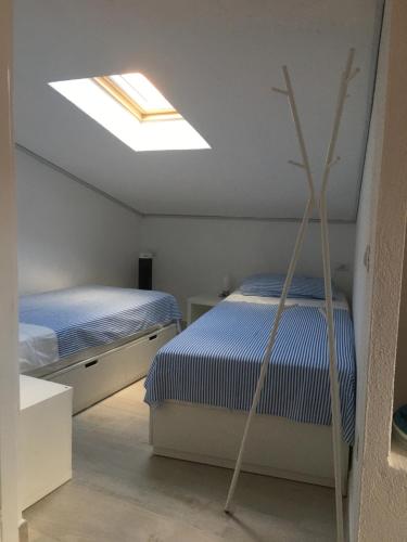 Postel nebo postele na pokoji v ubytování Casa Maia with shared swimming pool