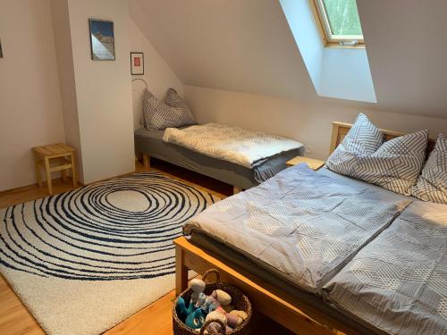 Ein Bett oder Betten in einem Zimmer der Unterkunft Apartmán Mezi Kopci - Mid Hills Apartment