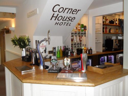 
The lounge or bar area at The Corner House Hotel
