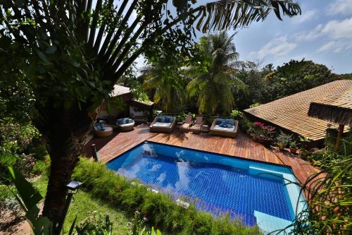 an image of a swimming pool at a resort at Xamã Senses - Hotel Pousada in Pipa